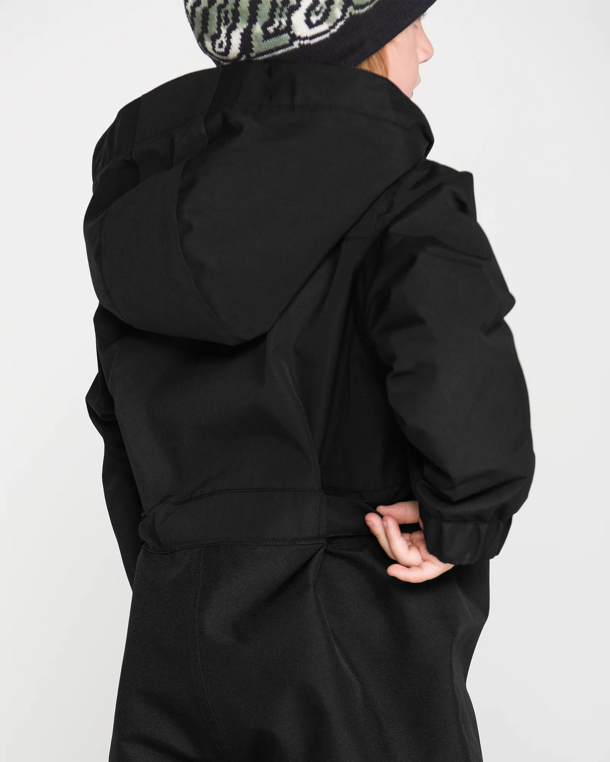 Habit de neige Little Flurry - Volcom noir à capuche pour enfant vu de dos
