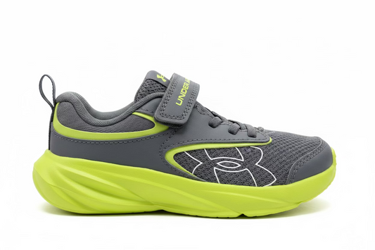 Espadrilles Surge 5 - Under Armour pour enfant, gris foncé et vert citron, style sportif avec fermeture à scratch, vue de profil gauche.