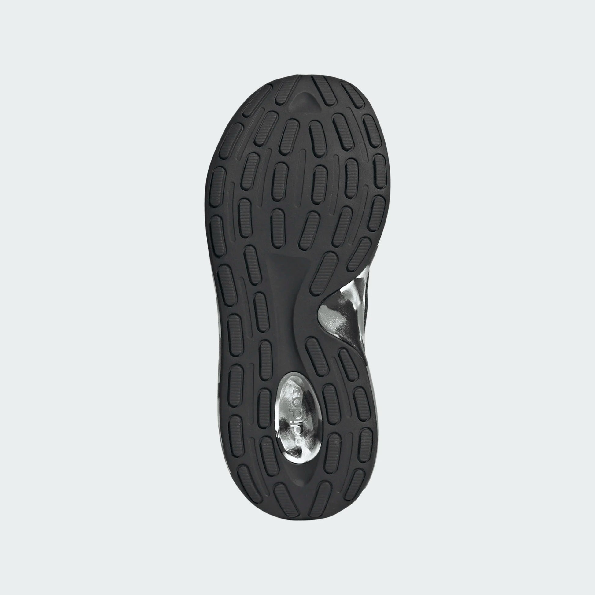 Semelle noire avec motifs antidérapants, détails argentés, vue de dessous des Espadrilles Lite Racer Adapt 8.0 K - Adidas.