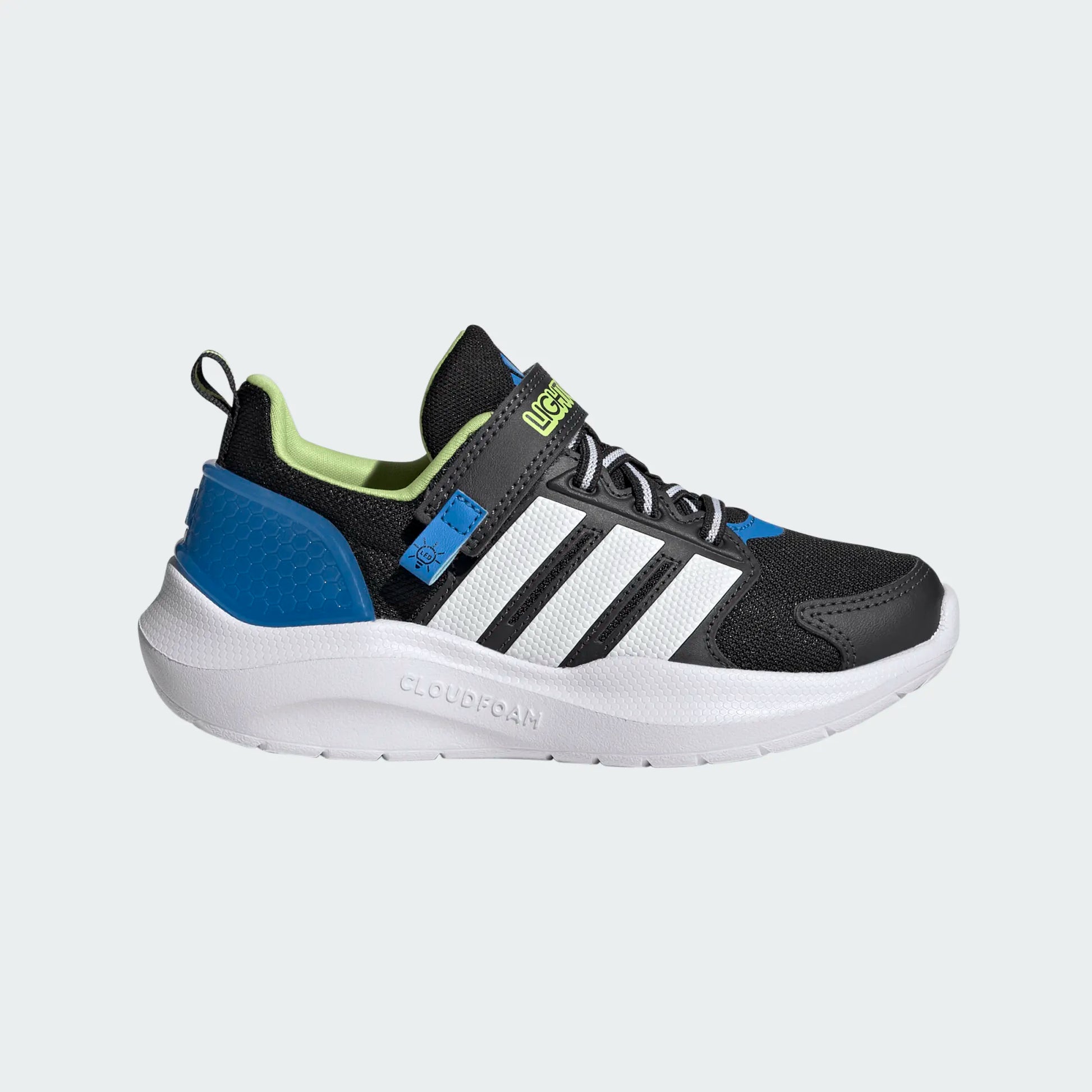 Espadrilles Lightorama - Adidas noires avec détails bleus et verts, semelle blanche en matériau Cloudfoam, style sport pour enfant, vue de côté gauche.