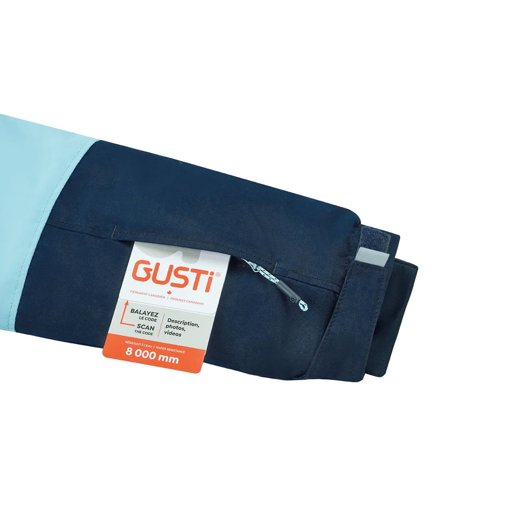 Habit de neige Lauren - Gusti en tissu bleu marine et bleu clair avec détail de manche et étiquette d’imperméabilité