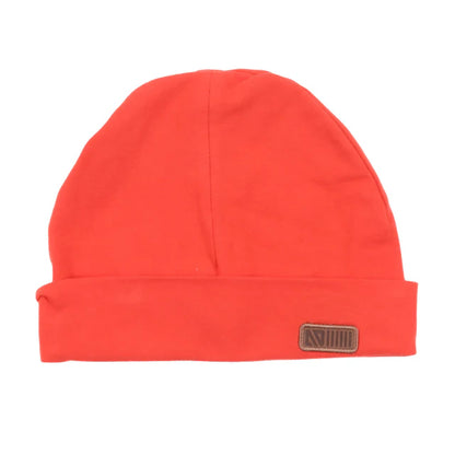 Tuque Mi-Saison - Nanö orange uni en tissu doux avec étiquette en cuir, vue de face, enfant.