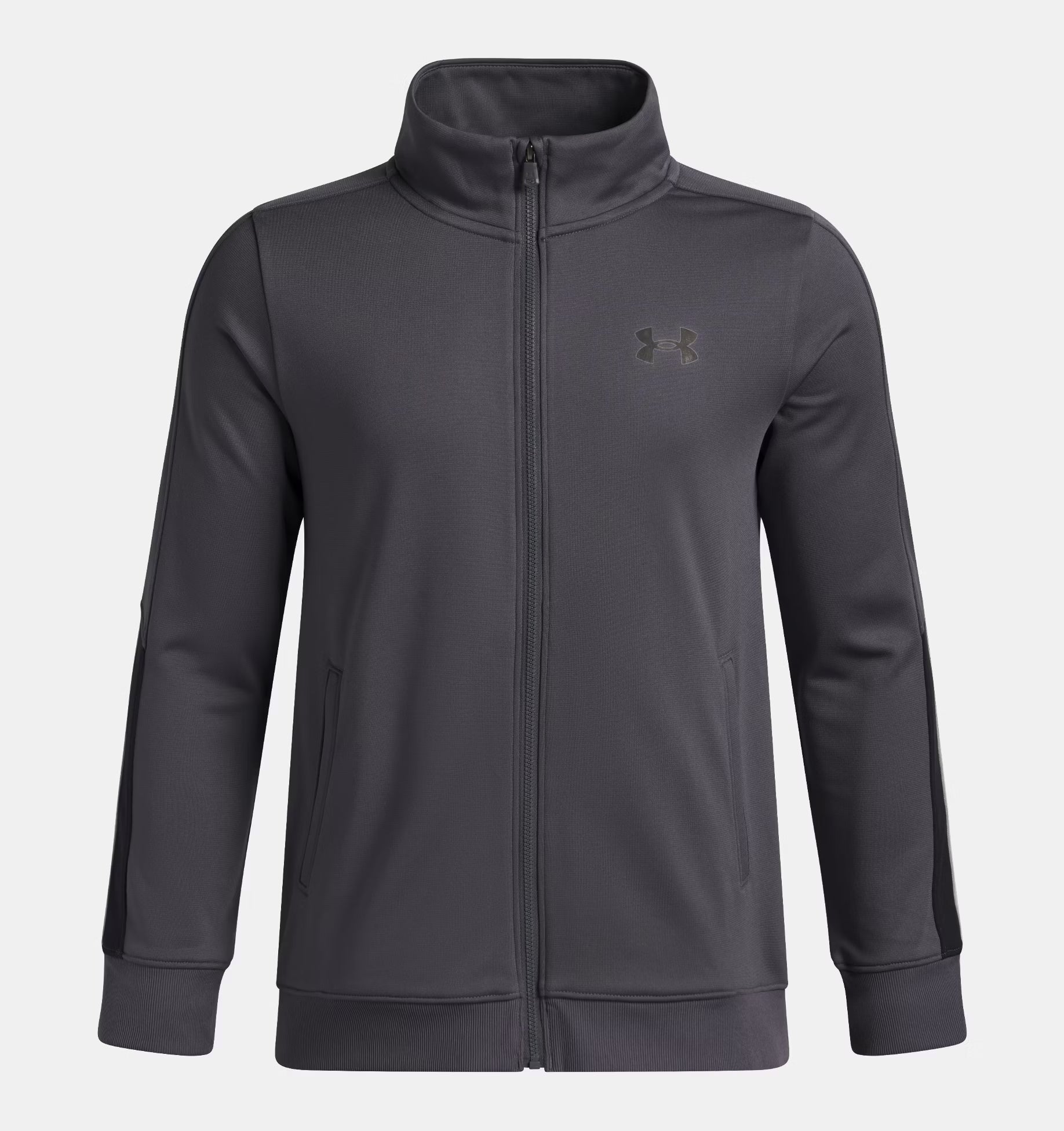 Veste - Under Armour grise foncée à zip intégral avec col montant, manches longues, vue de face, style sport pour enfant.
