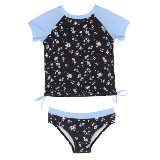Maillot de bain - Nanö tankini noir à motifs floraux bleus et roses, manches courtes bleues, culotte assortie, vue de face enfant