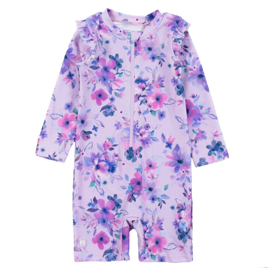 Maillot de bain - Nanö combinaison imprimée fleurie violette et rose manches longues avec volants pour bébé fille vue de face