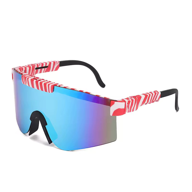 Lunettes de soleil - Kids Windshield avec verre miroir bleu et monture rayée rouge et blanche, style sportif, vue de face angle trois-quarts.