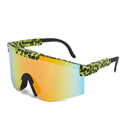 Lunettes de soleil - Kids Windshield, verre miroitant orange et bleu, monture verte imprimé léopard, pour enfant, vue de trois-quarts.