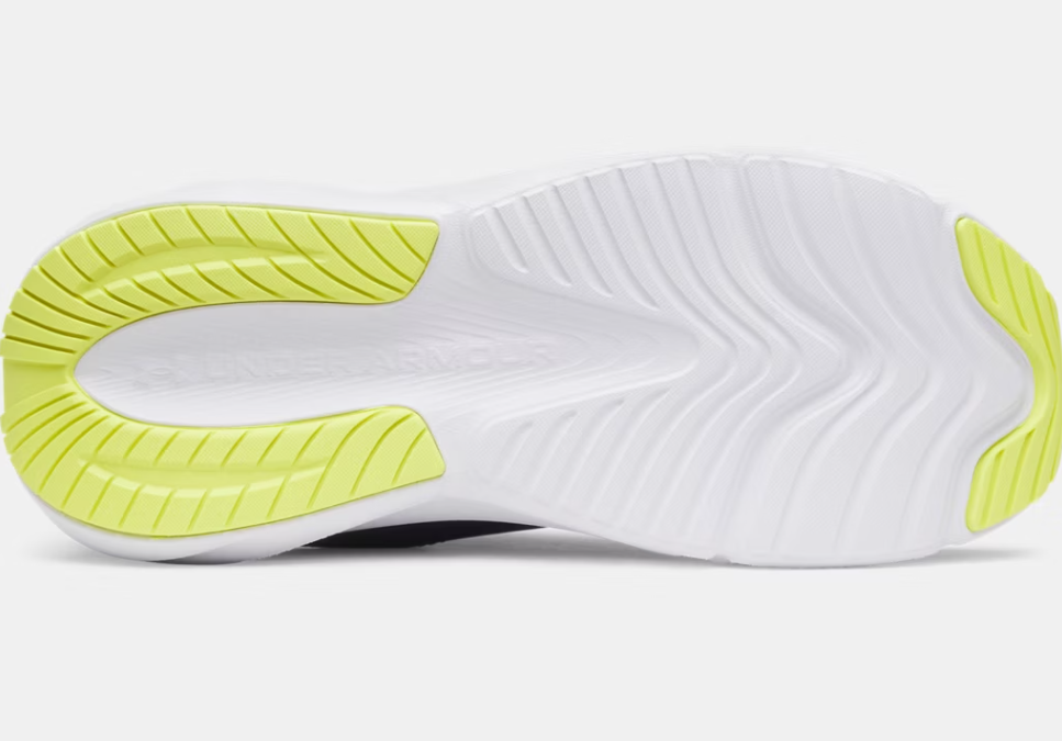 Semelle extérieure blanche avec détails verts clair de l’Espadrilles UA Surge 5 - Under Armour, vue en détail de dessous.