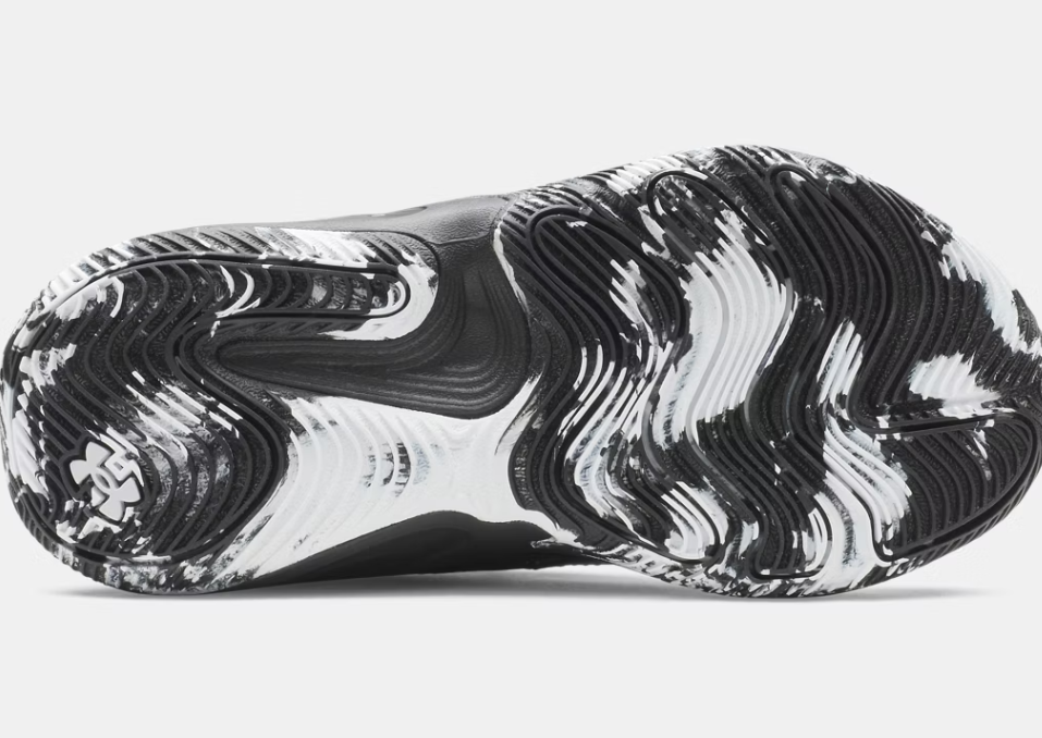 Semelle extérieure noire et blanche avec motifs ondulés, détail du design antidérapant des Espadrilles UA Lockdown 8 - Under Armour.