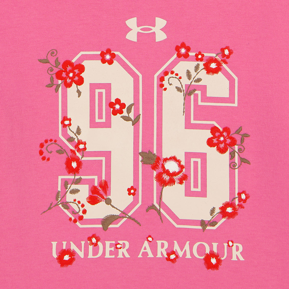 T-Shirt - Under Armour rose avec logo et motif floral rouge et blanc sur le devant vue de détail