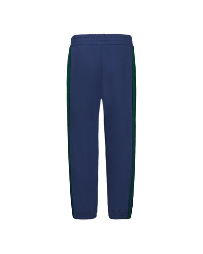 Pantalon - Under Armour bleu marine avec bandes latérales vertes, taille et chevilles élastiquées, vue de face