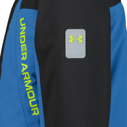 Manteau d'hiver - Under Armour noir et bleu avec logo jaune fluo sur la manche en vue rapprochée