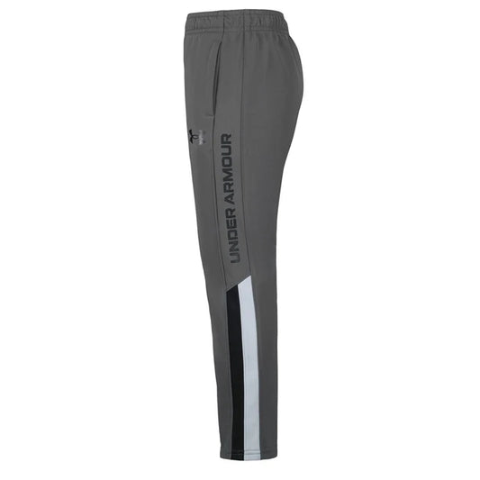 Pantalon - Under Armour gris foncé avec bande noire et blanche sur le côté, style sportif, vue de profil
