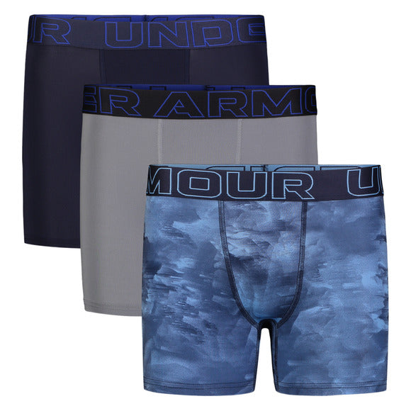 Lot de 3 Paires de boxers - Under Armour en tissu technique, couleurs bleu camouflage, gris uni et noir, coupe ajustée, vue de face.