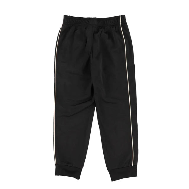 Pantalon - Under Armour noir avec bandes latérales blanches, coupe droite, tissu en matière technique, vue de face.