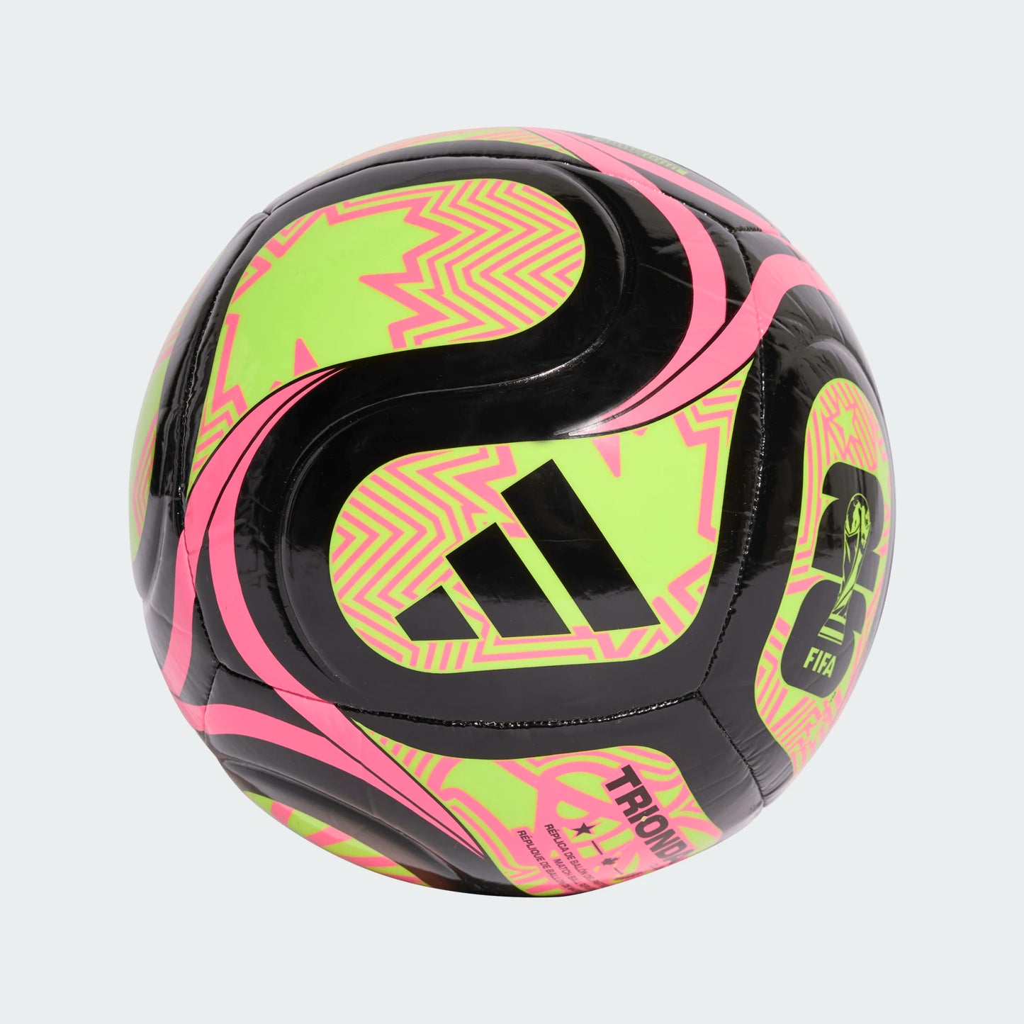 Ballon de soccer FIFA - Adidas noir avec motifs roses et verts fluo, surface lisse, vue de profil.