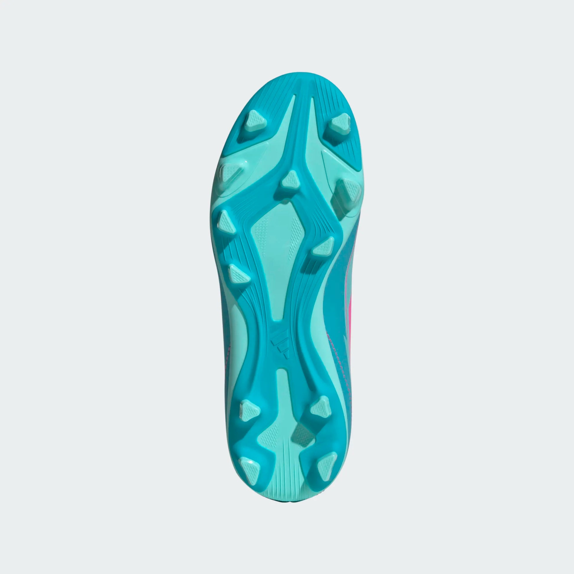 Chaussures de soccer - F50 Club FG Adidas vue de dessous semelle turquoise et bleu clair crampons FG pour fille junior