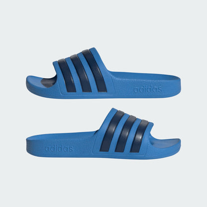 Adidas Adilette Aqua sandals for juniors, featuring a comfortable slip-on design and classic three-stripe branding.