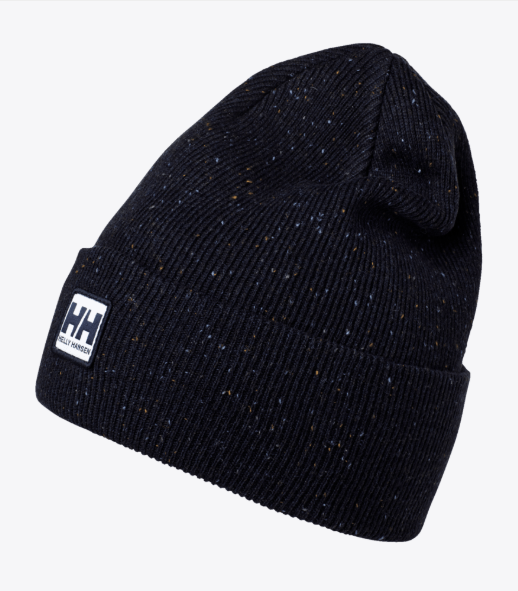 Tuque d'hiver - Helly Hansen en tricot noir à petits motifs colorés, style côtelé avec revers et logo, vue de côté.