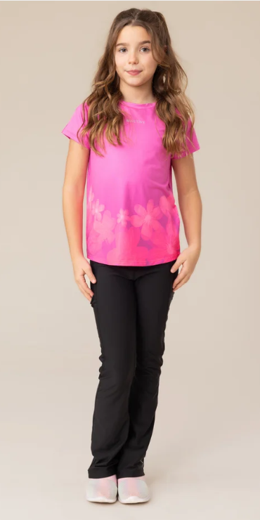 Legging athlétique Noir - Nanö porté par enfant fille, en tissu extensible noir, vue de face intégrale.