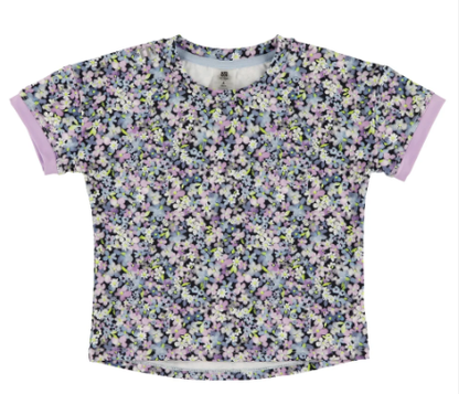 T-Shirt athlétique - Nanö à manches courtes avec motif floral multicolore pastel sur fond noir, bordures lilas, vue de face.