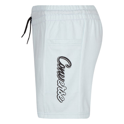 Short - Converse blanc en jersey plissé avec logo noir vertical, ceinture élastique et cordon, pour fille, vue de profil droit.