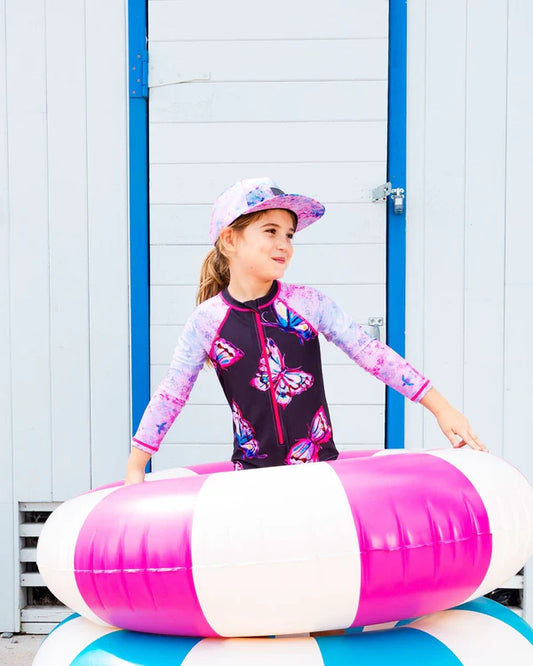 Maillot de bain - Deux Par Deux combinaison rashguard manches longues noir et rose papillons, fille, vue de face porté