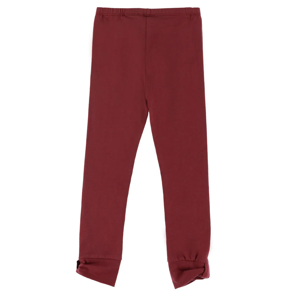 Legging - Nanö bordeaux uni en coton avec taille élastique, style simple pour enfant, vu de face, pieds partiellement retournés.