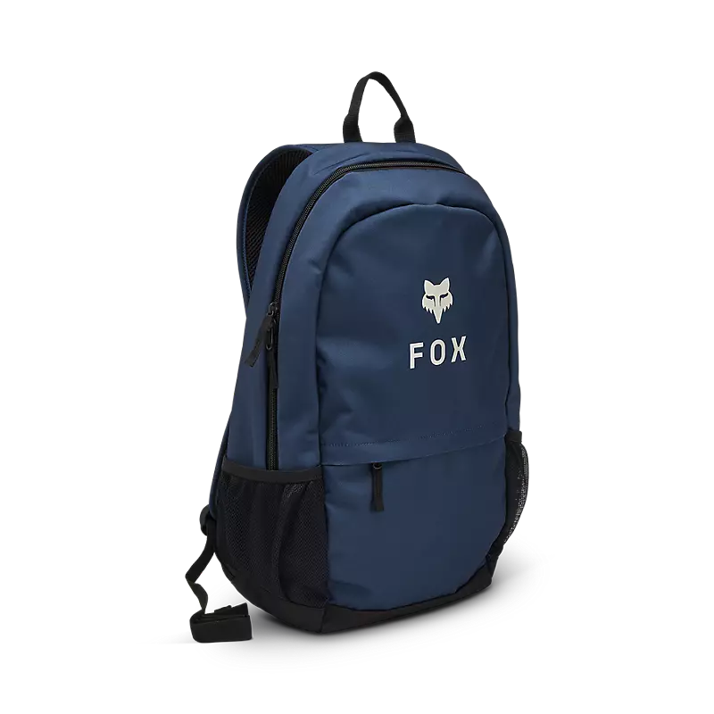 Sac à dos - Fox bleu marine avec logo blanc, poches filet latérales, style scolaire, vue de profil gauche.