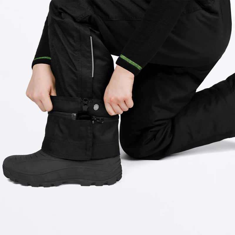 Salopette de neige Excursion Ice Pro - FXR noire imperméable avec renforts 600D, détail fermeture bas jambes, vue gros plan