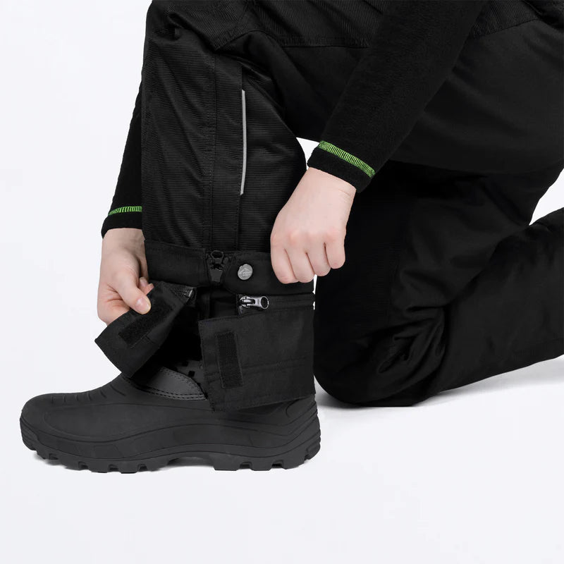 Salopette de neige Excursion Ice Pro - FXR noire en nylon, détail fermeture cheville, portée enfant vue gros plan