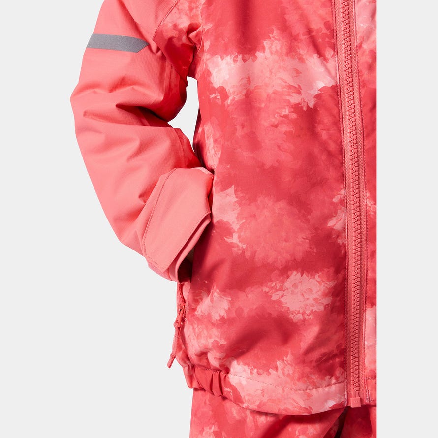 Manteau d'hiver - Helly Hansen rouge et rose avec motifs dégradés, pour fille, vue de détail sur manche et poche côté.
