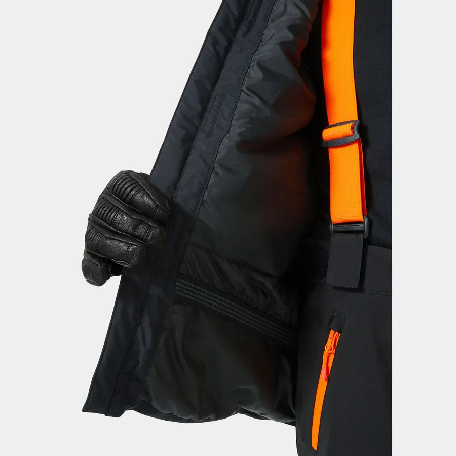 Manteau d'hiver Level Ski - Helly Hansen noir avec intérieur matelassé, détail fermeture et gants, vue gros plan sur manche