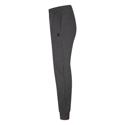 Pantalon - Hurley gris foncé en terry français avec poches latérales et logo brodé, style jogger pour garçon, vue de profil.