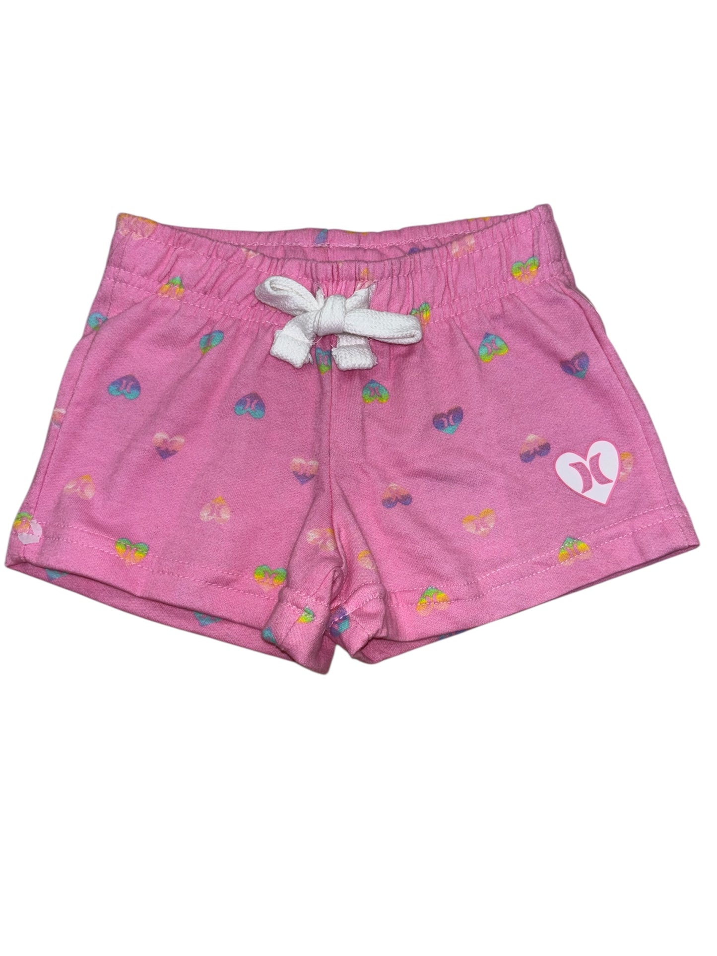 Short - Hurley rose avec petits motifs multicolores en forme de cœur, ceinture élastique ajustable, pour fille, vue de face.
