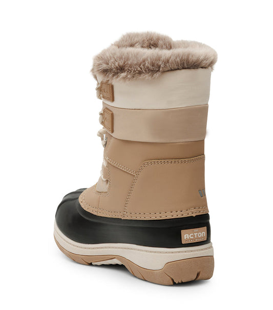 Bottes d'hiver Lolly - Acton beiges pour enfant avec col en fourrure brides et semelle noire vue de côté