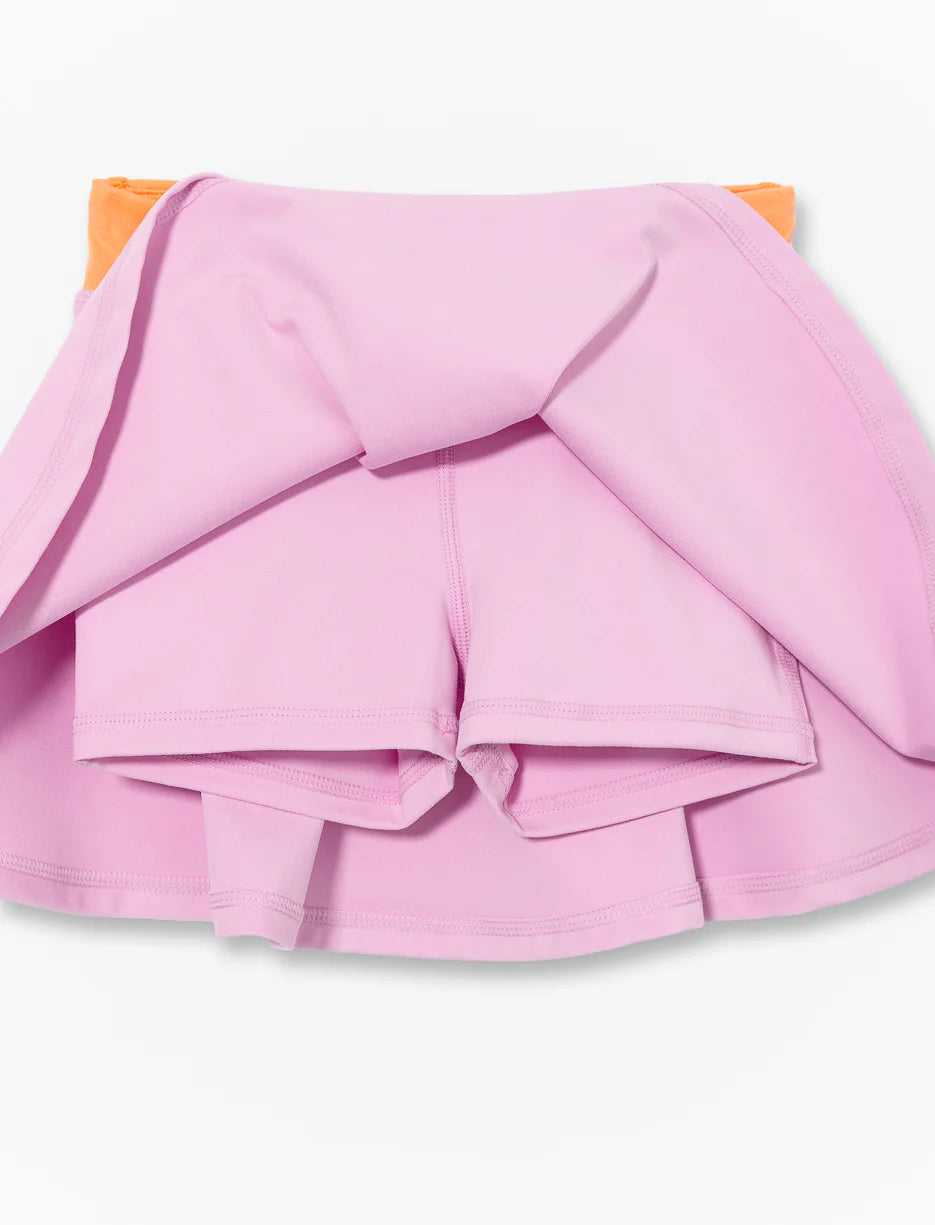 Jupe Short - M.I.D lilas avec taille croisée pêche en polyester et élasthanne, vue de face et de dos sur fond blanc.