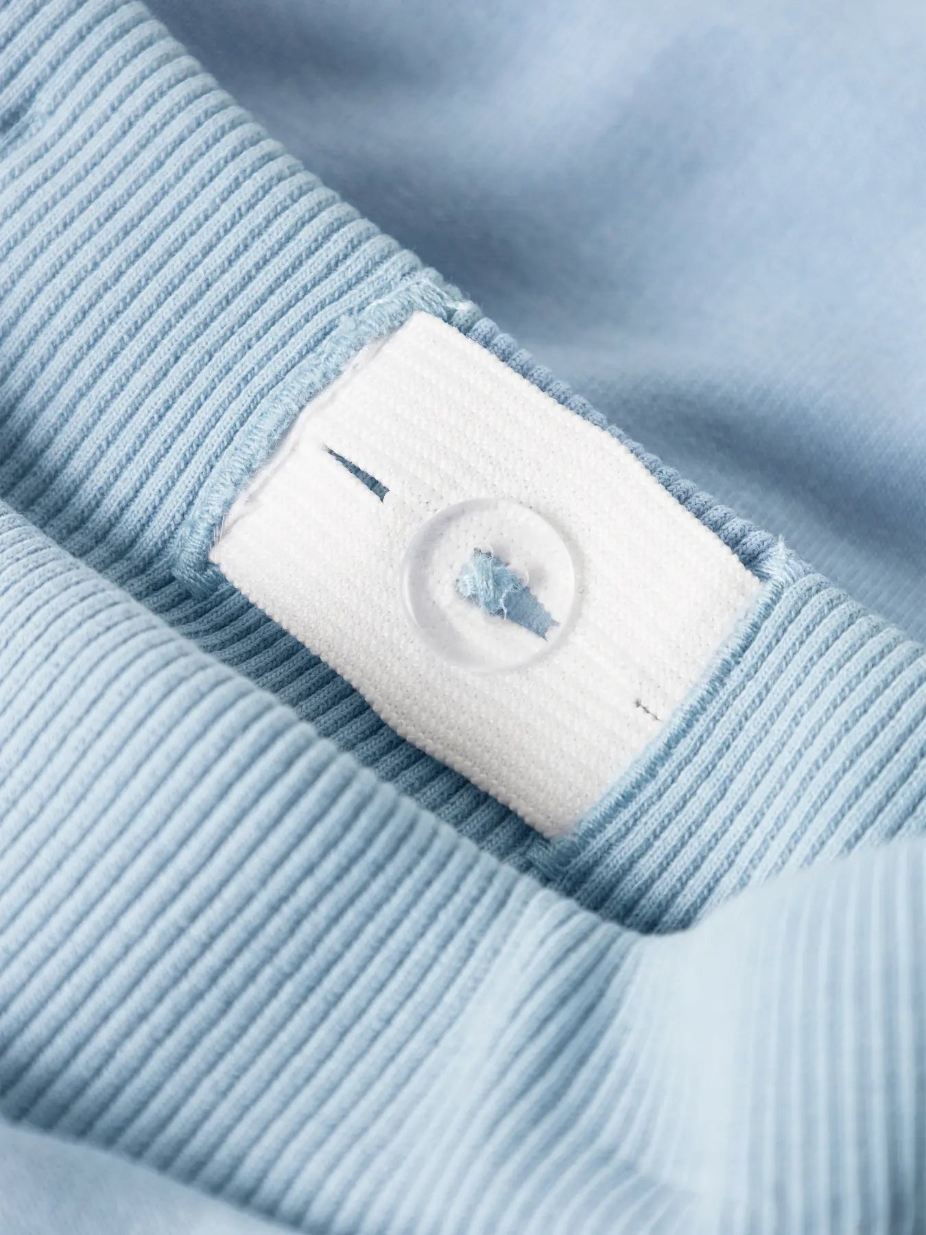 Pantalon - Name It bleu clair en coton et polyester avec détail bouton ajustable, pour fille et garçon, vue gros plan taille intérieur