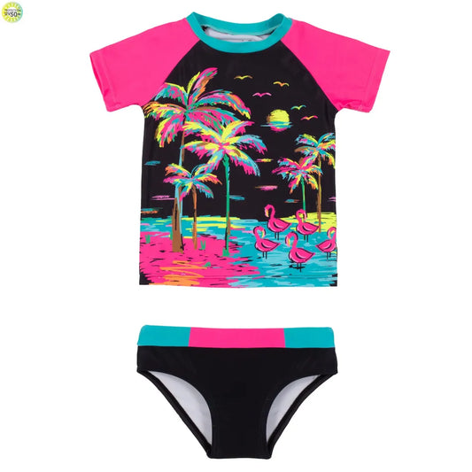 Maillot de bain - Nanö deux pièces noir avec motifs palmiers multicolores, manches courtes fuchsia, pour fille, vue de face