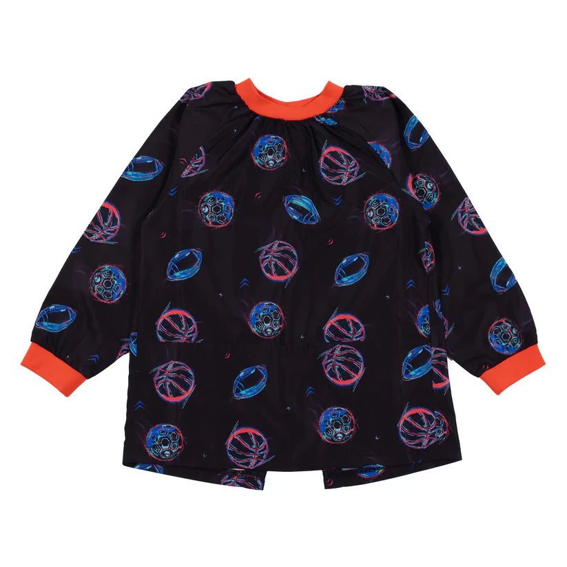 Tablier - Nanö noir à motifs ronds bleus et rouges, polyester, poignets et col côtelés rouges, enfant, vue de face.