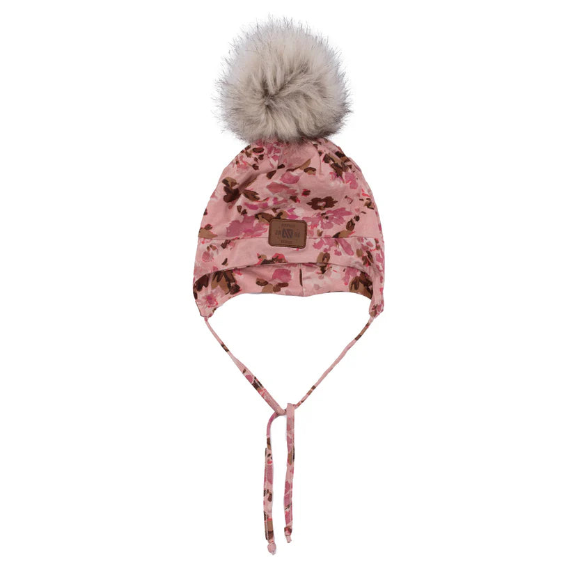 Tuque en jersey avec oreilles doublée en polar - Nanö rose à motif floral marron avec pompon beige vue de face.