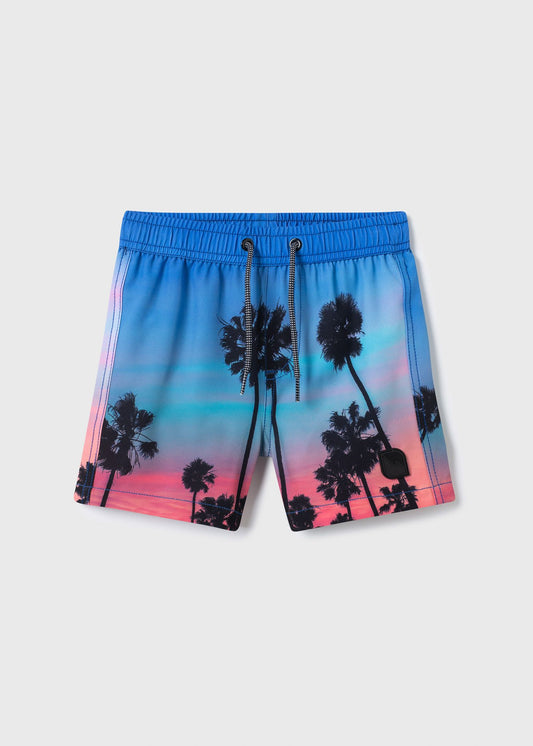 Maillot de bain - Northcoast short garçon bleu dégradé rose avec imprimé palmiers noirs, vue de face.