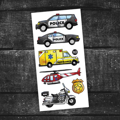 Feuille de tatouages temporaires Pico Tatoo - Urgence 911 avec véhicules police noir et blanc, ambulance jaune, hélicoptère rouge, moto police, vue de face.