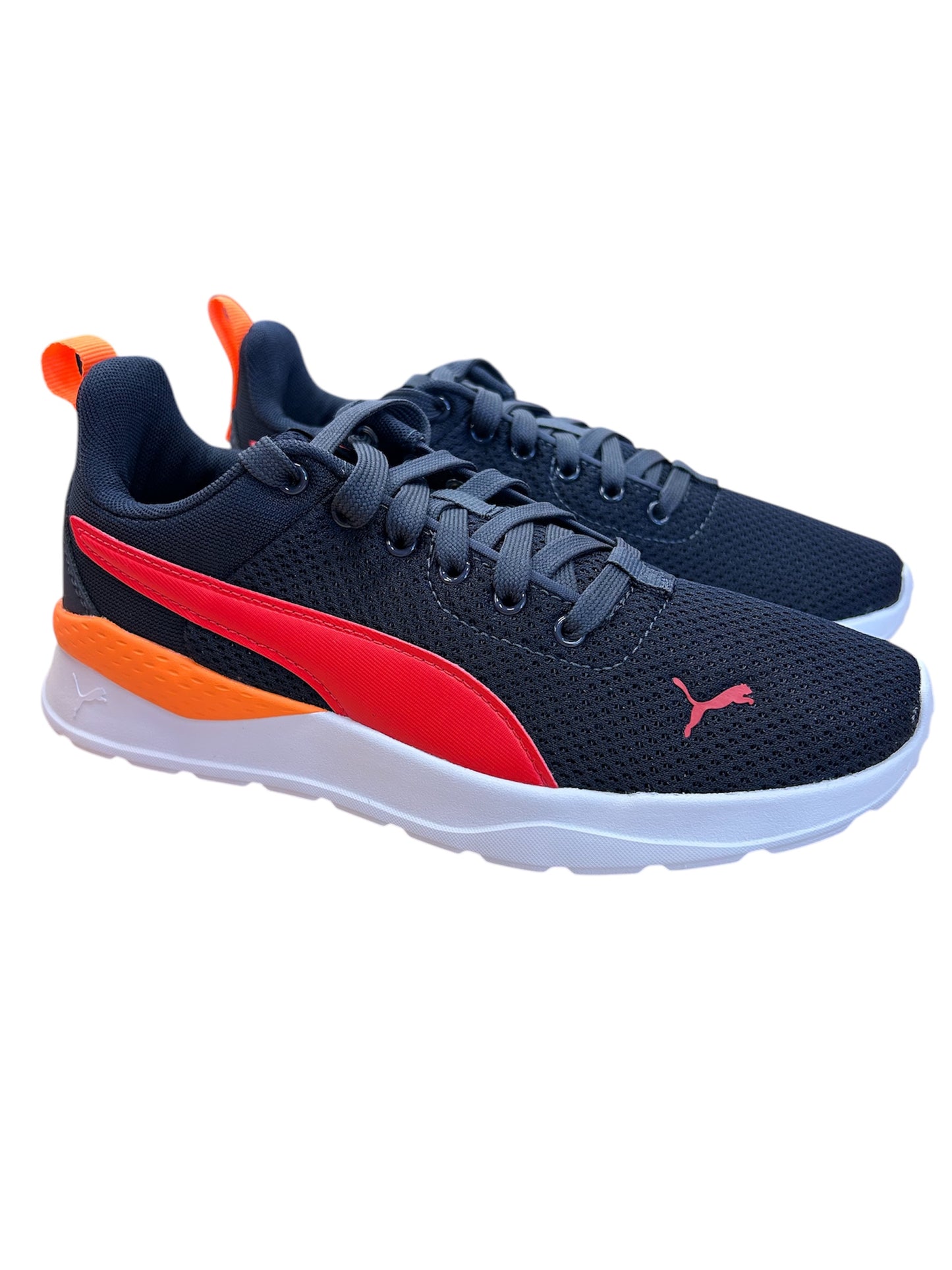 Espadrilles - Anzarun Lite Puma bleu marine avec détails rouges et orange, mesh respirant, pour garçon vue de profil côté extérieur.