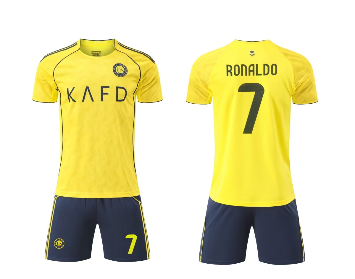 Ronaldo soccer set for kids, featuring a jersey and shorts in vibrant colors, perfect for young fans aged 6 years.