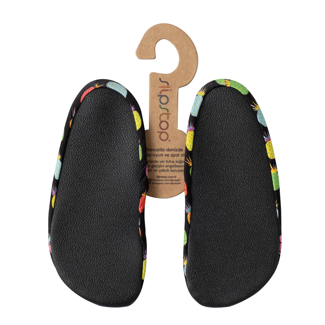 Slip Stop chaussures d'eau noires avec motifs fruits colorés multicolores, semelle antidérapante, pour enfant, vue de dessous