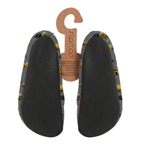 Slip Stop chaussures d'eau enfant gris à motifs engins jaunes et noirs, semelle antidérapante noire, vue dessus