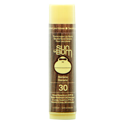 Baume à lèvres écran solaire FPS 30 - Sun Bum, stick marron avec logo singe jaune, vue de face, format tube compact.