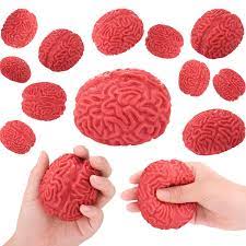 Cerveau Gluant - Jouet Sensoriel rouge en silicone, texture nervurée, pour enfant, vues en gros plan et en main.