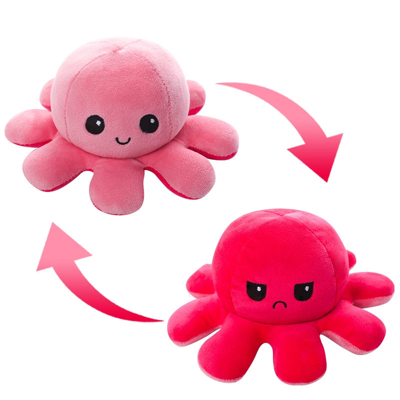 Pieuvre En Peluche Réversible en tissu doux, faces roses et rouge vif, style cartoon, pour enfant, vue de face des deux expressions.